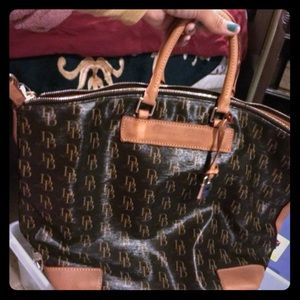 Dooney and Bourke, comes with crossbody strap
